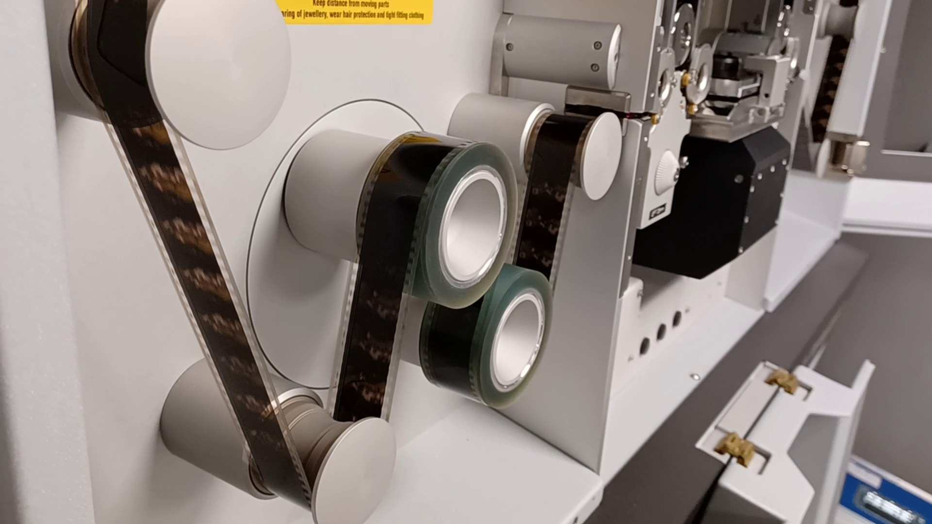 De digitalisering van een film door de scanner. 